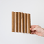 NU Wall Arc Reeded Medium Oak wall panel sample showing textured, reeded wood grain in warm medium oak finish.