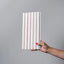 White washed travertine reeded wall panel by NU Wall, showcasing textured surface and natural stone look for interior decor.