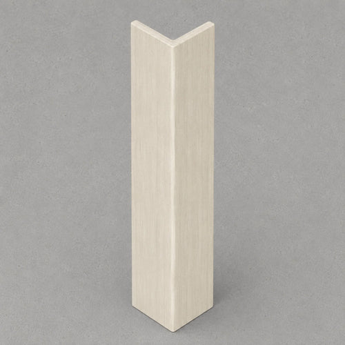 Cool beige travertine corner trim by NU Wall, showcasing a smooth, natural stone finish designed for elegant wall corner accents.