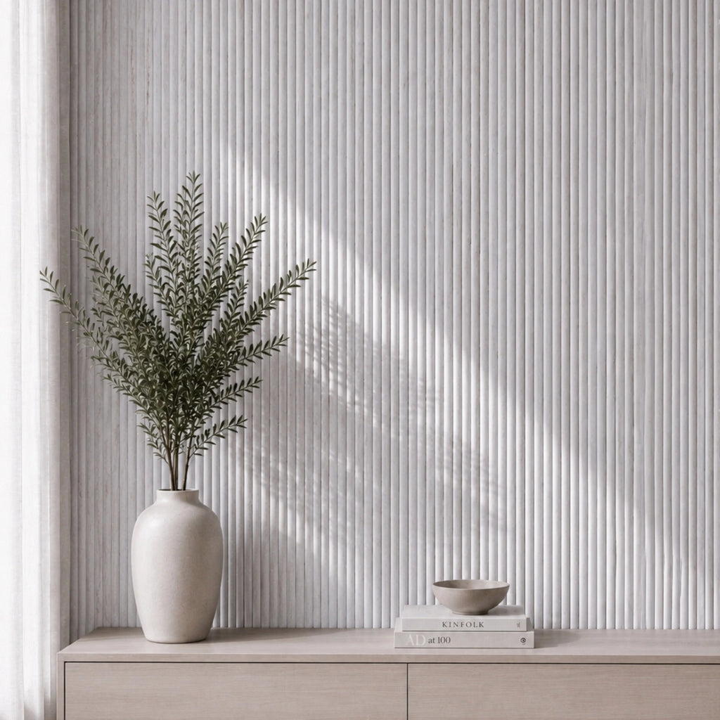 NU Wall Luxe White Washed Travertine Reeded Panel wall panel with textured, white washed travertine surface and reeded design.