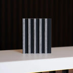 NU Wall Palm Grey Oak and Black small slatted wall panel sample showing textured wood grain and modern design.