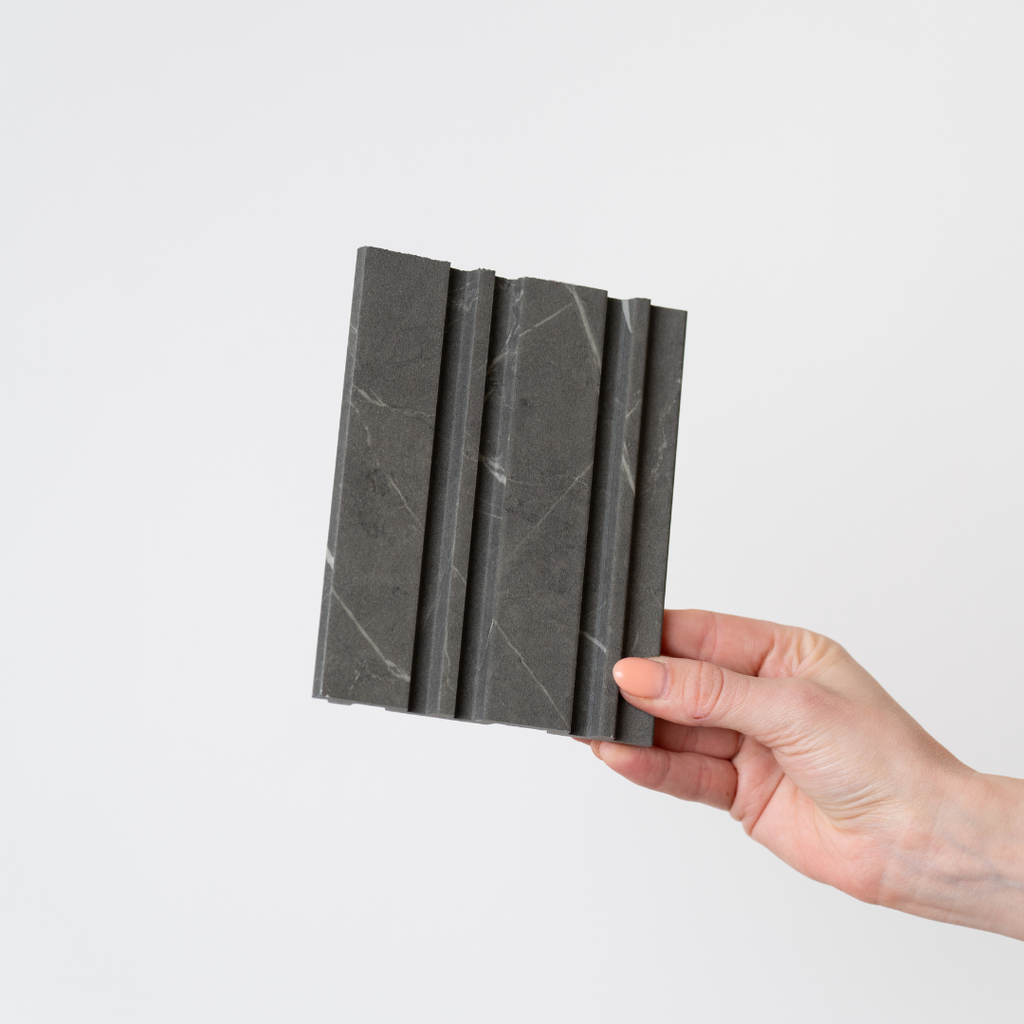 NU Wall Dubai Midnight Storm slatted wall panel sample showing dark, textured wooden slats for modern interior design.