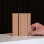 Dubai Natural Oak Slatted Wall Panel Sample by NU Wall showing textured oak wood slats for interior wall decor.