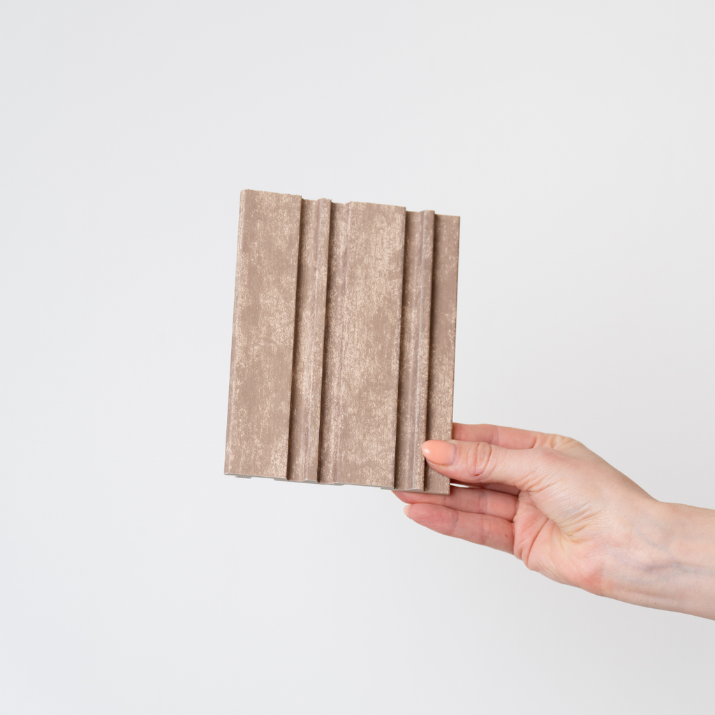 NU Wall Dubai Camel Sand slatted wall panel sample showing textured beige surface and wooden slats for interior decor.