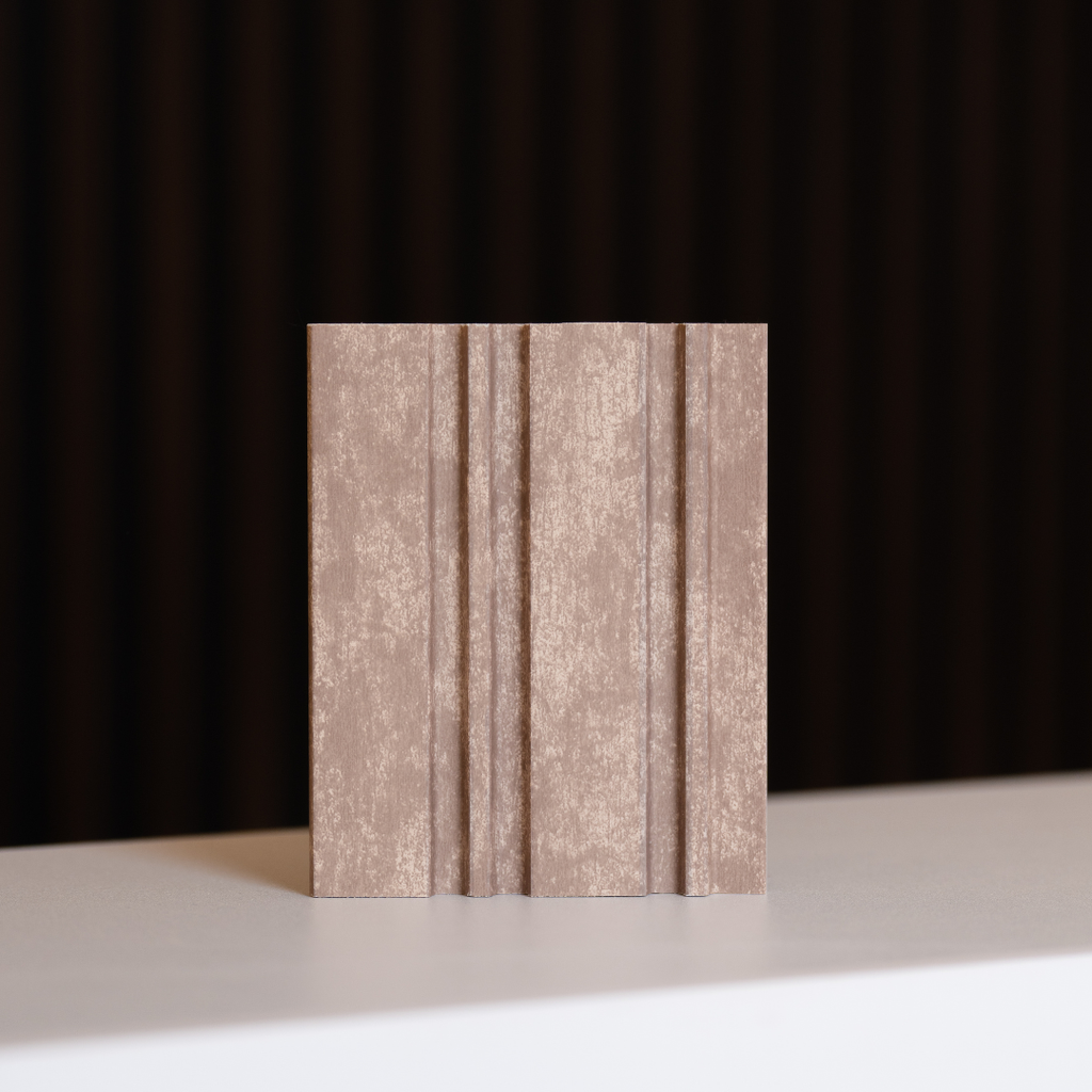 NU Wall Dubai Camel Sand slatted wall panel sample showing textured, warm-toned wooden slats for interior wall decor.