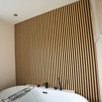 NU Wall Residence light oak and black slatted wall panels pack of 4, showcasing modern wooden and black slatted design for interior decor.