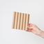 NU Wall Arc Reeded Light Oak wall panel sample showing textured reeded wood grain and light oak finish for interior design accents.