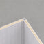 White washed travertine internal corner trim by NU Wall, WPC joint trim for seamless wall finishing and elegant interior detail.