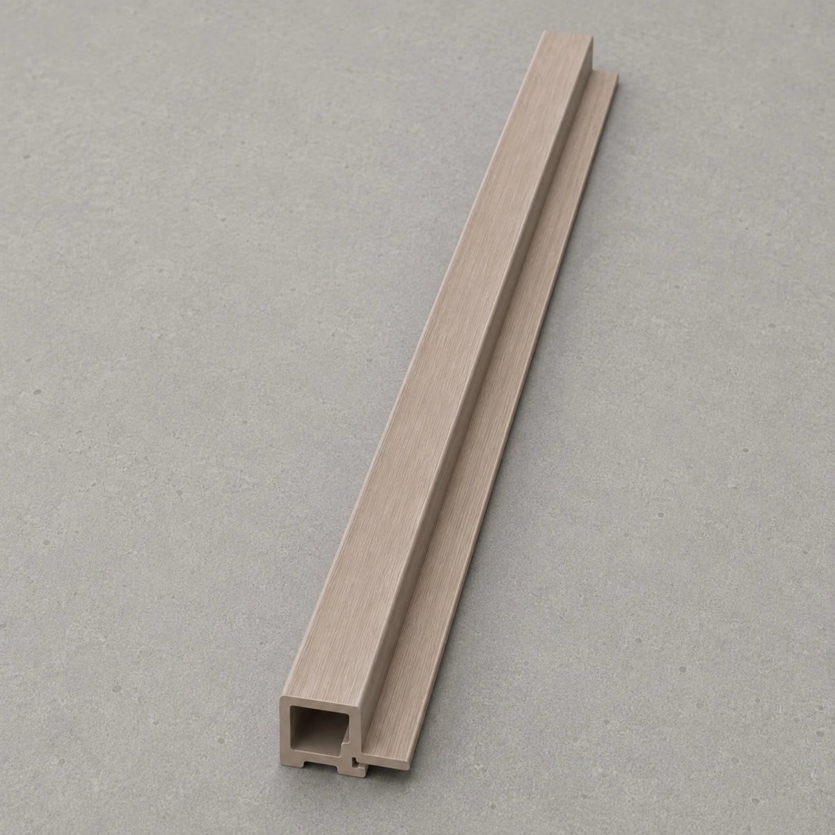 NU Wall Mink Oak Large Slatted End Cap WPC joint trim with tongue design, showcasing a warm brown finish and slatted detail.