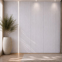 NU Wall Luxe White Washed Travertine Flat Panel wall panel showcasing a smooth, white washed travertine surface for interior decor.