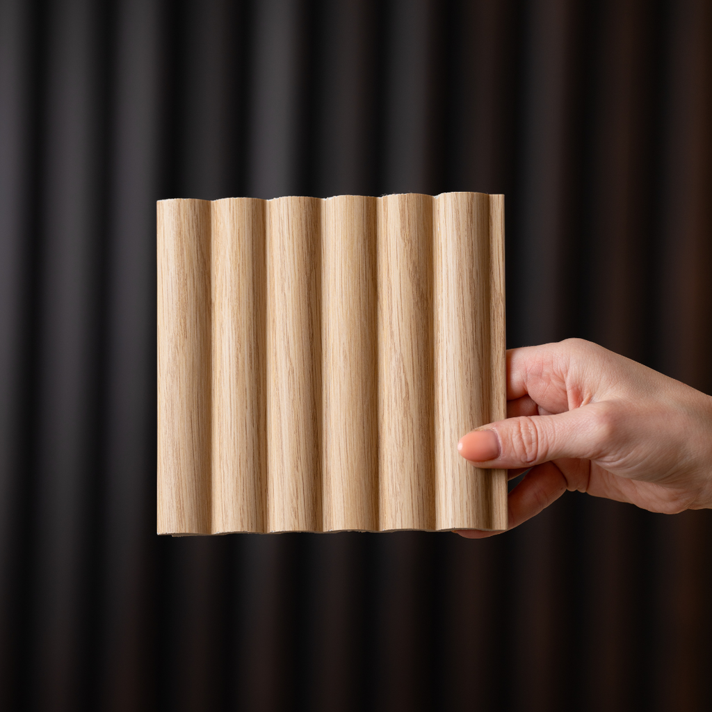 NU Wall Arc Reeded Light Oak wall panel sample showing textured light oak wood grain and reeded design on a flat panel surface.