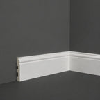 NU Wall Legacy skirting board sample with 100mm length, 100mm width, and 15mm depth showing the wood grain texture.