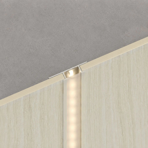 NU Wall LED joint trim in cool beige travertine, WPC joint trim for seamless wall and flooring edges, showcasing textured surface.