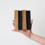 NU Wall Residence Medium Oak and Black Slatted Wall Panel sample showing wood slats in medium oak finish with black accents