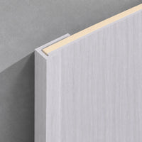 White washed travertine end trim from NU Wall's WPC joint trims collection, showcasing a smooth, natural stone finish.