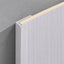 White washed travertine end trim from NU Wall's WPC joint trims collection, showcasing a smooth, natural stone finish.