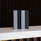NU Wall Residence grey oak and black slatted wall panels, pack of 4, featuring modern wood and black slat design for interior decor.