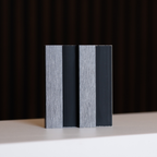 NU Wall Residence grey oak and black slatted wall panel sample showing textured grey oak finish with black slats for modern wall decor.