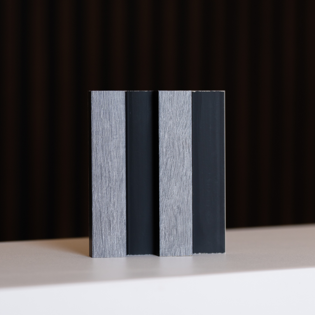 NU Wall Residence grey oak and black slatted wall panel sample showing textured grey oak finish with black slats for modern wall decor.