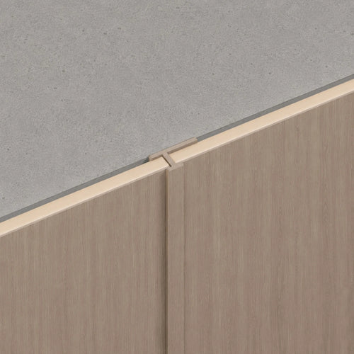 NU Wall Joining Trim Mink Oak WPC joint trim for seamless flooring and wall transitions, featuring a sleek, natural wood finish.