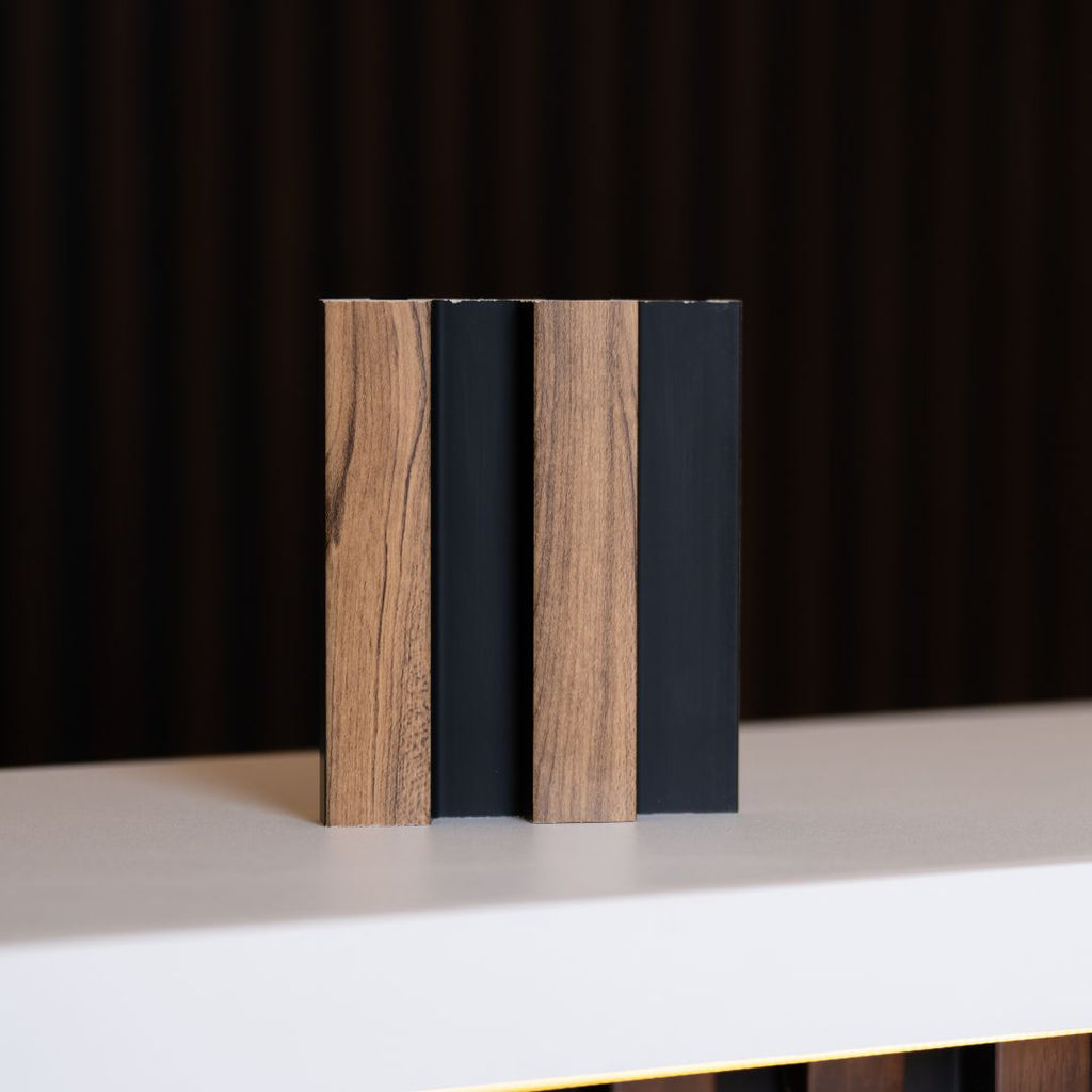 NU Wall Residence pack of 4 medium oak and black slatted wall panels, showcasing modern wood grain and sleek black accents.