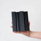 NU Wall Residence brushed black slatted wall panels pack of 4, showing black wooden slats with a sleek brushed finish.