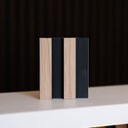 NU Wall Residence light oak and black slatted wall panels, pack of 4, showing modern wood and black metal slat design.