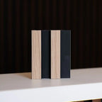 NU Wall Residence light oak and black slatted wall panels, pack of 4, showing modern wood and black metal slat design.