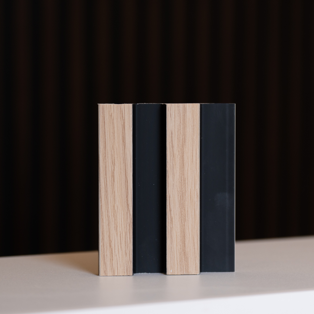 NU Wall Residence light oak and black slatted wall panel sample showing modern wood and black slat design.