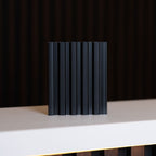 NU Wall Palm Brushed Black small slatted wall panel sample showing textured black slats and sample dimensions.