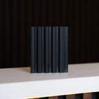 NU Wall Palm Brushed Black small slatted wall panel sample showing textured black slats and sample dimensions.